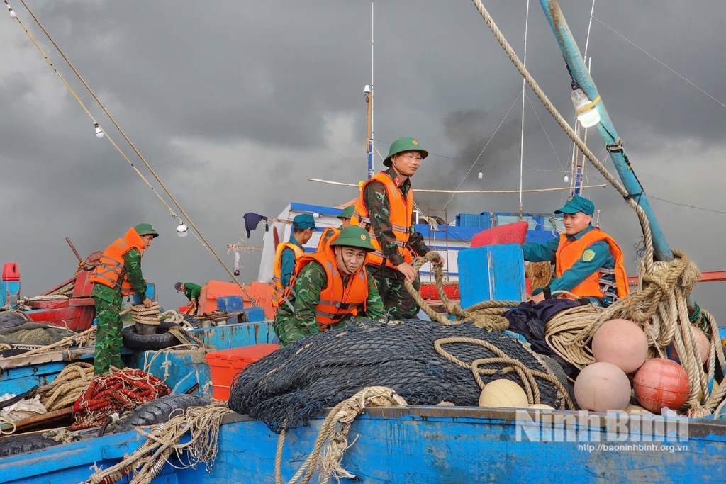The provincial border guard force are supporting fishing vessels to be secured at anchorage points.