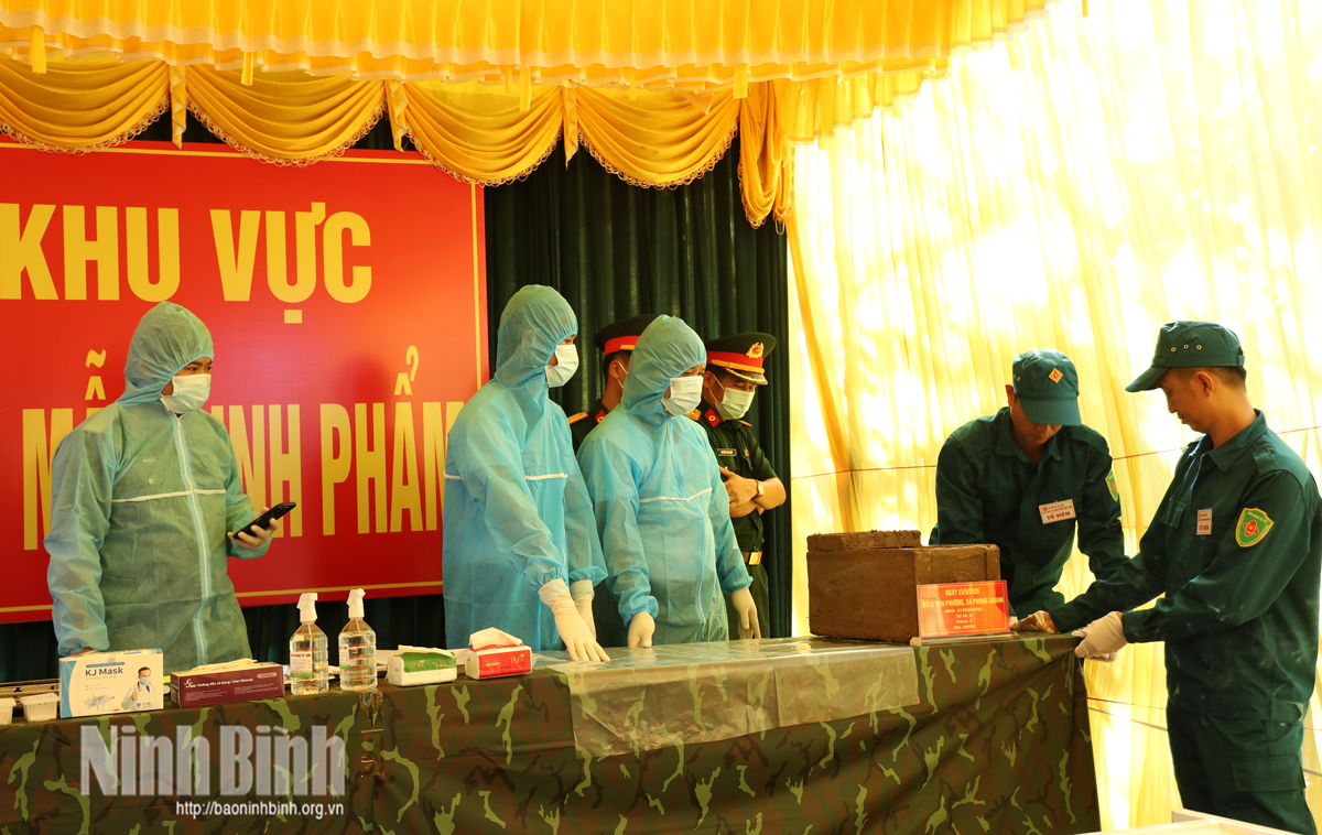 Collecting DNA samples from martyrs’ remains at Yen Phuong cemetery.